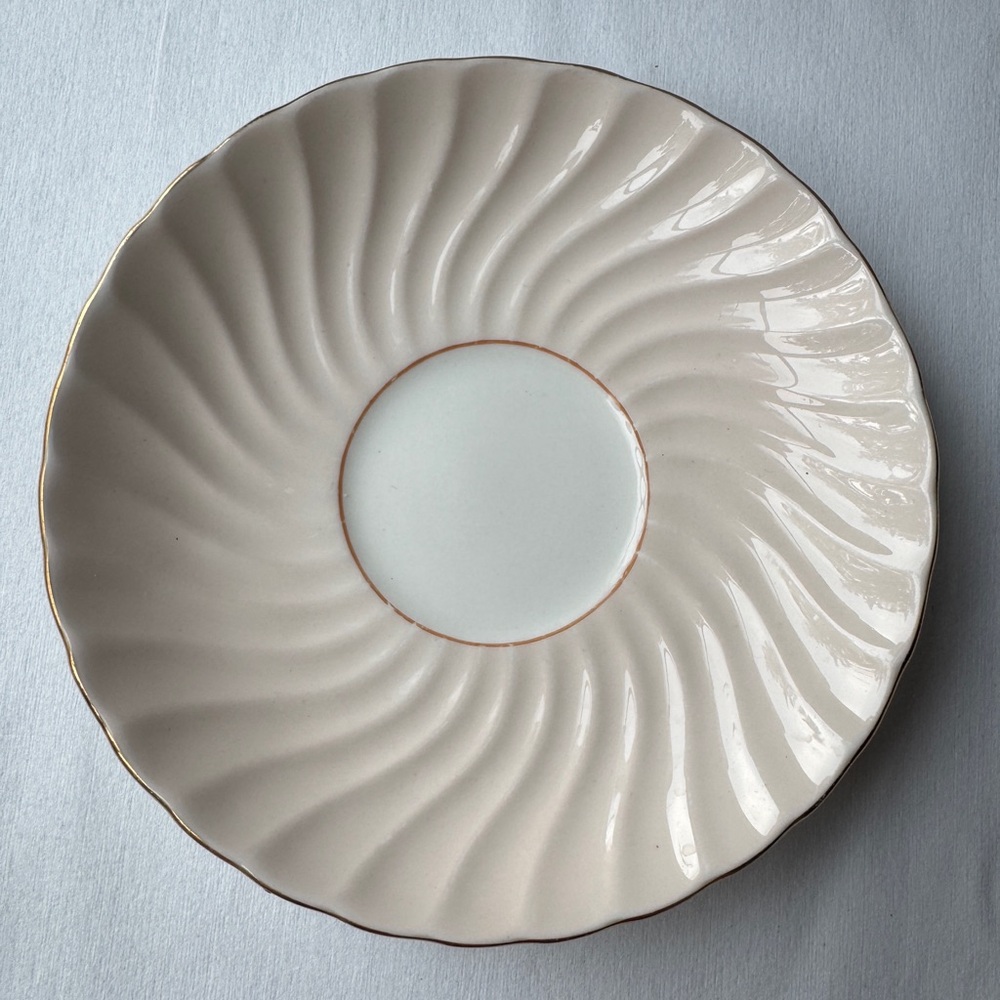 Cream Ceramic Drinkware with Swirled Design